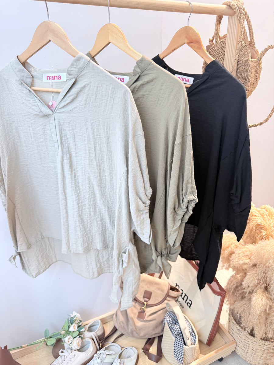 软麻前短后长宽松衬衫